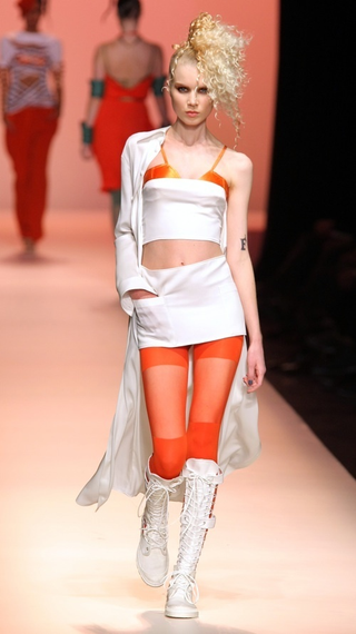 Illustration for article titled Jean-Paul Gaultier: Brights, Bras, Bellies, And Braids